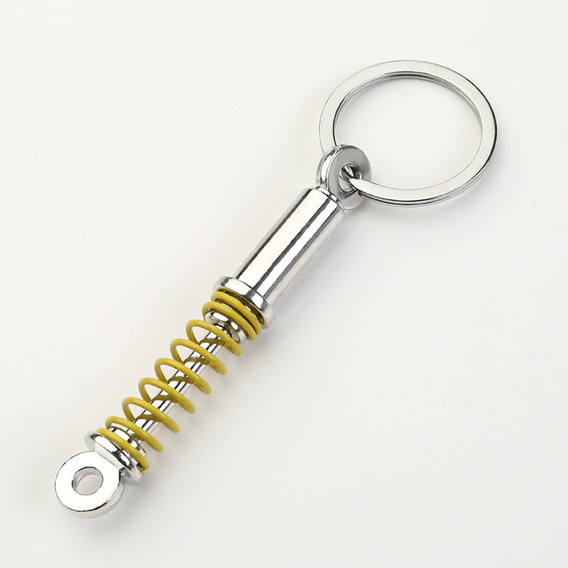 Simple Alloy Unisex Keychain with Creative Car Parts Design