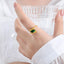 Luxurious Geometric Titanium Steel 18k Gold Plated Ring with Emerald Cut Green Zircon