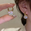 Simple Heart Shape Alloy Flower Gemstone Unisex Earrings with Rhinestone Design