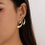 Retro Geometric Alloy Earrings with Irregular Metal Droplets