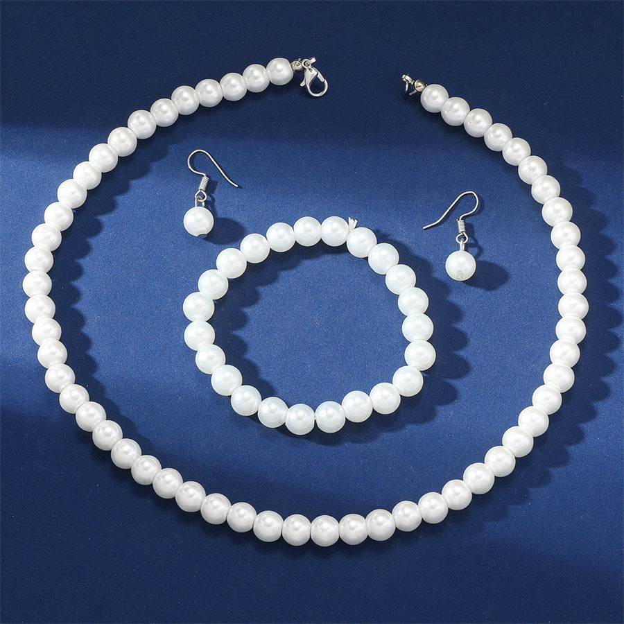 Elegant Pearl Jewelry Set - Necklace, Earrings, and Bracelet