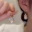 Simple Heart Shape Alloy Flower Gemstone Unisex Earrings with Rhinestone Design