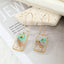 Simple Style Flower Synthetic Resin Alloy Epoxy Transparent Women'S Dangling Earrings 1 Pair