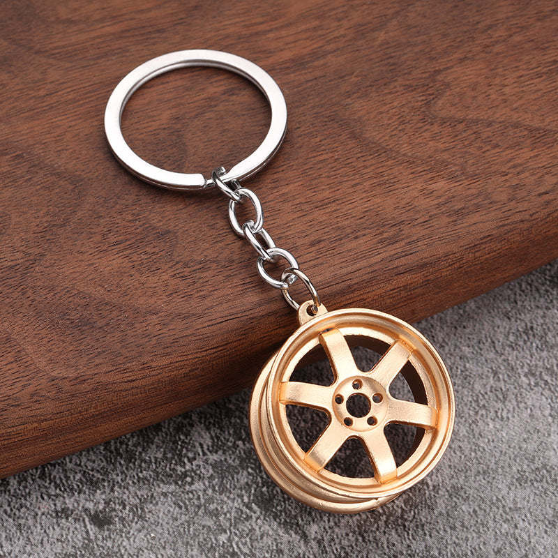 Simple Alloy Unisex Keychain with Creative Car Parts Design