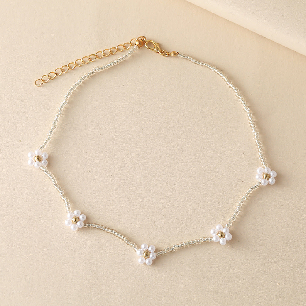 Handmade Beaded Daisy Necklace with Rice Beads and Small Flower Charms