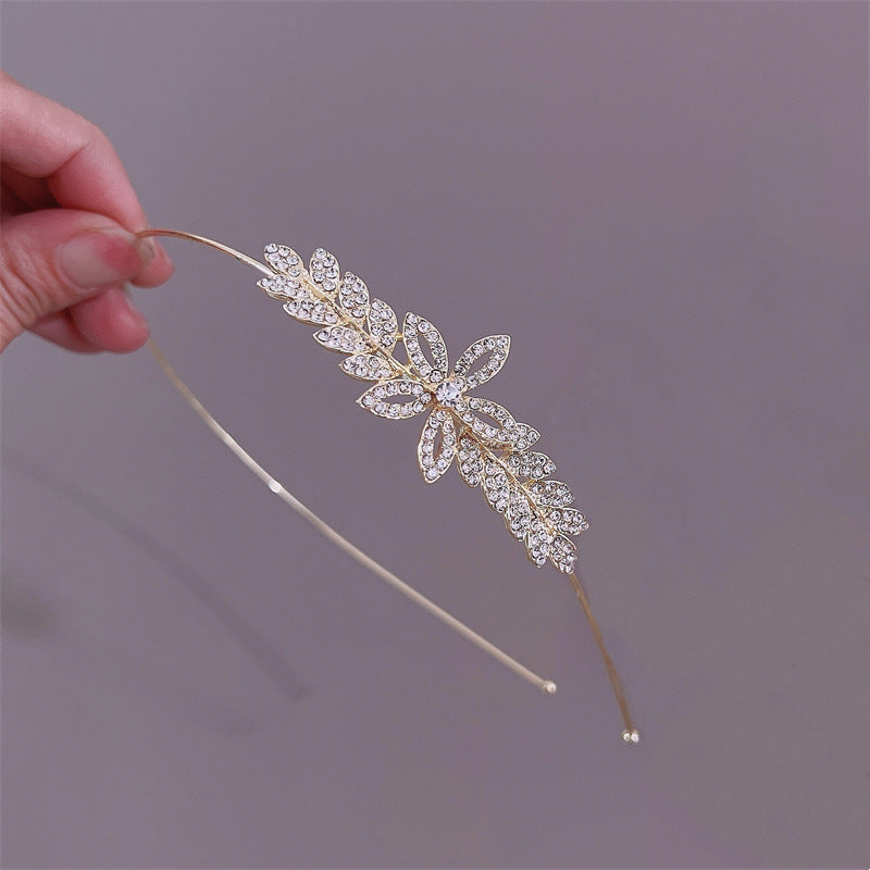 Elegant Rhinestone and Pearl Embellished Hairband