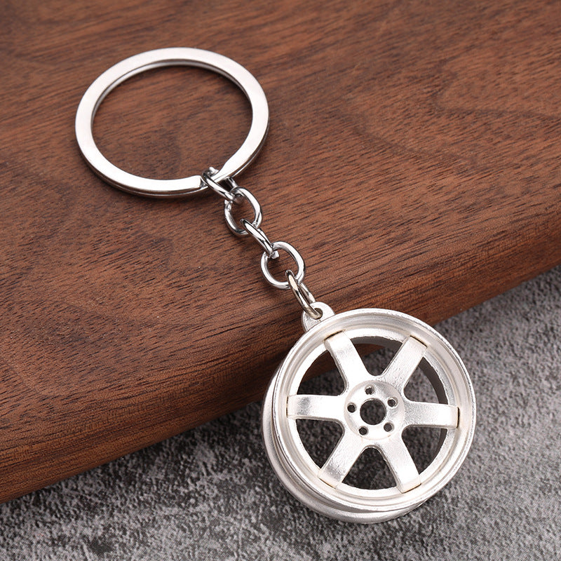 Simple Alloy Unisex Keychain with Creative Car Parts Design