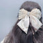 Women's Elegant Satin Bow Hair Clip with Rhinestones and Lace Detailing