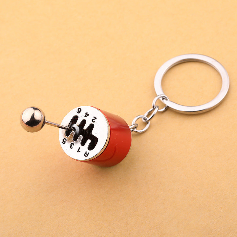 Simple Alloy Unisex Keychain with Creative Car Parts Design