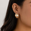 Retro Geometric Alloy Earrings with Irregular Metal Droplets