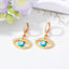 Retro Devil's Eye Alloy Drop Earrings with Hollow Eyelash Design