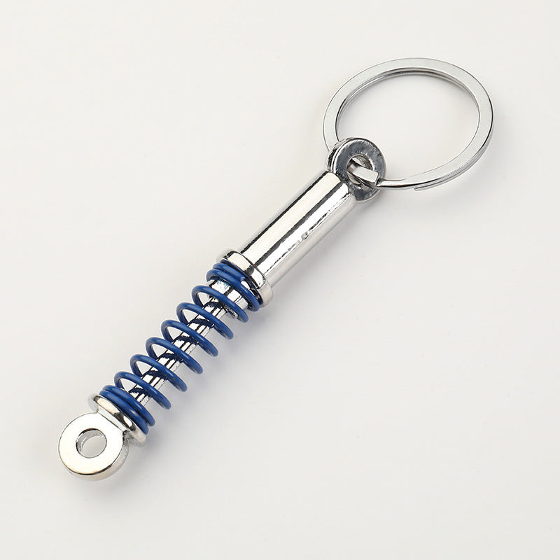 Simple Alloy Unisex Keychain with Creative Car Parts Design