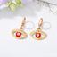 Retro Devil's Eye Alloy Drop Earrings with Hollow Eyelash Design