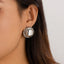 Retro Geometric Alloy Earrings with Irregular Metal Droplets