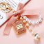 Cute Bow Knot Perfume Bottle Pearl Keychain for Women