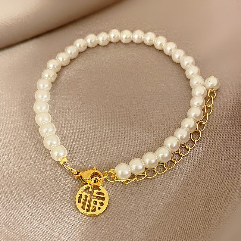 Elegant Heart-Shaped Zircon and Pearl Bracelet