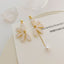 Fashion Asymmetrical Flower Petal Pearl Clip-On Earrings for Women