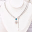 Blue Water Droplet Heart Pendant Necklace with Zircon and Pearl Tassels in Titanium Steel