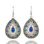 Bohemian Alloy Hollow Drop-shaped Colored Diamond Earrings Wholesale