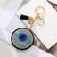 Vintage Style Heart Eye PU Leather Keychain with Rhinestone Tassel Pendant