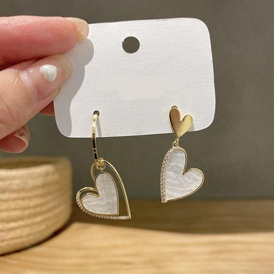 Asymmetric Heart Shell Earrings with Hollow Double-Layer Design in S925 Silver