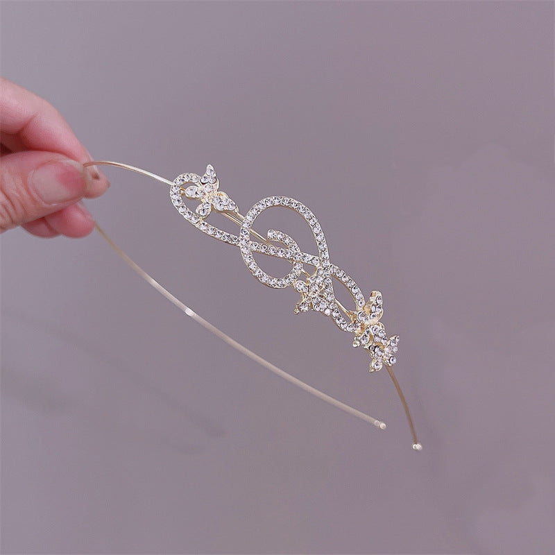 Elegant Rhinestone and Pearl Embellished Hairband