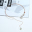 Retro Geometric Alloy Choker with Pearl Tassel Design