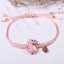 Simple Style Animal Alloy Rope Bracelet - Korean Couple Dinosaur Design, Hand-Woven Red Rope for Women and Students, Cute Gift