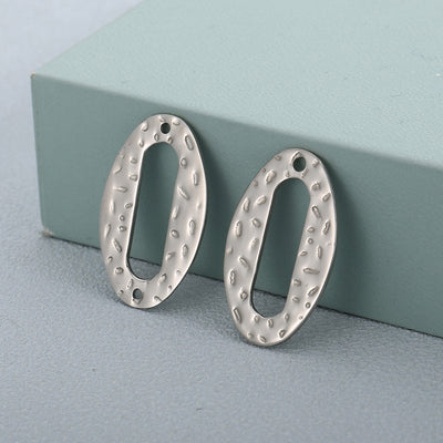 Oval Stainless Steel Jewelry Accessories with Irregular Concave Dot Pattern and Titanium Steel Hardware