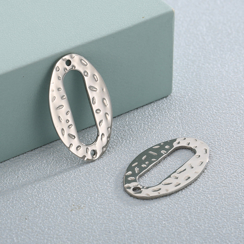 Oval Stainless Steel Jewelry Accessories with Irregular Concave Dot Pattern and Titanium Steel Hardware
