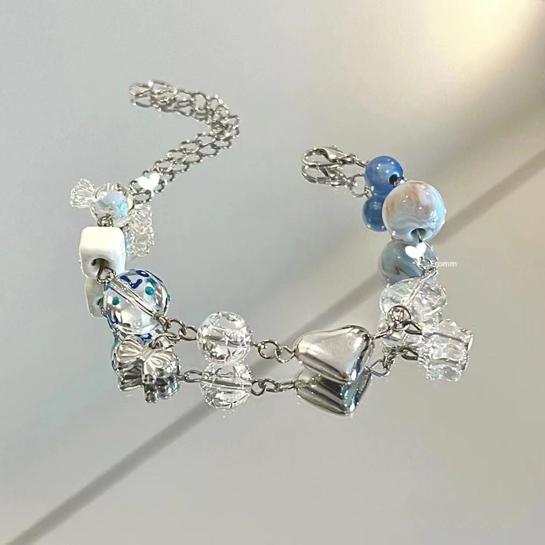 Sweet Clouds Rhombus Alloy Bracelet with Snowflake Pendant and Blue Beaded Bow Design