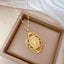 Titanium Steel Gold Plated Oval Portrait Zircon Pendant Necklace