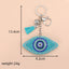 Vintage Style Heart Eye PU Leather Keychain with Rhinestone Tassel Pendant