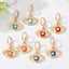 Retro Devil's Eye Alloy Drop Earrings with Hollow Eyelash Design