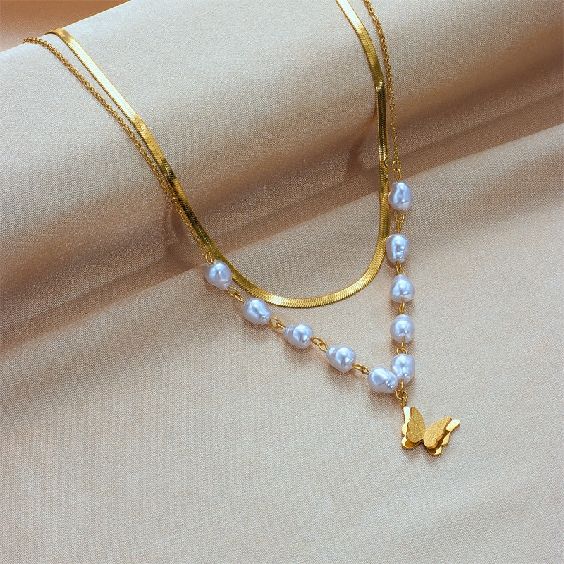 Baroque Butterfly Pearl 18k Gold Plated Layered Necklace with Heart and Starburst Pendant