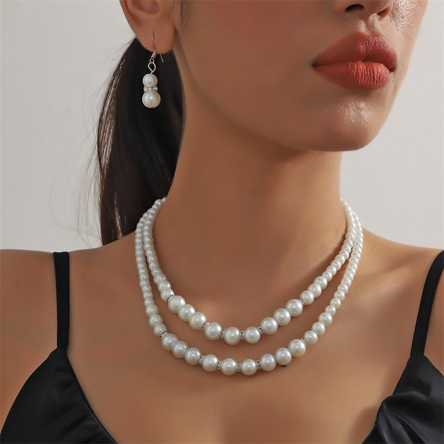 Elegant Pearl Jewelry Set - Necklace, Earrings, and Bracelet