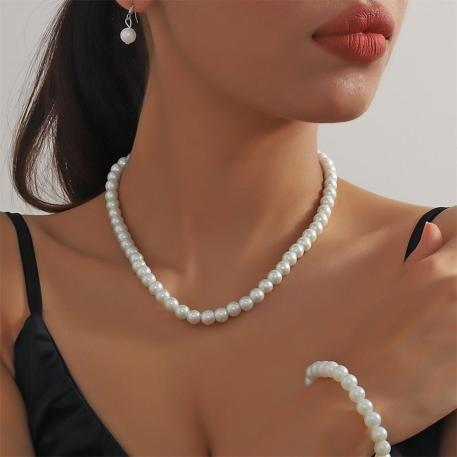 Elegant Pearl Jewelry Set - Necklace, Earrings, and Bracelet