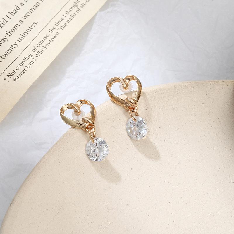 Fashion Alloy Heart-shaped Imitated Crystal Earrings NHPF147241