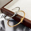 Fashion Minimalist Titanium Steel Knot Bangle Bracelet Plated in 18K Gold