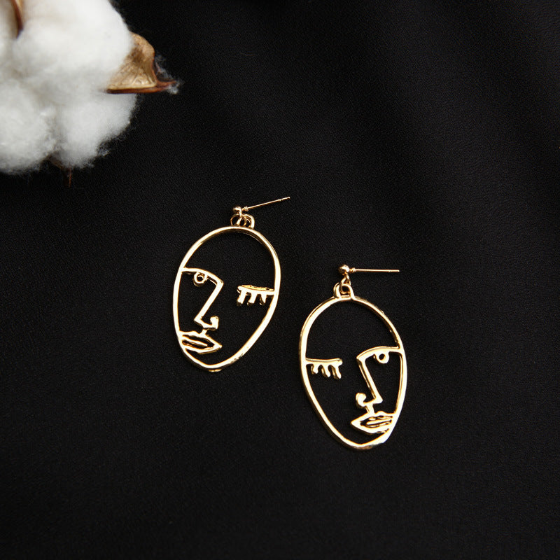 Korean Face Hollow Oval Earrings