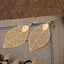 Korean Hollow Carved Metal Leaf Earrings