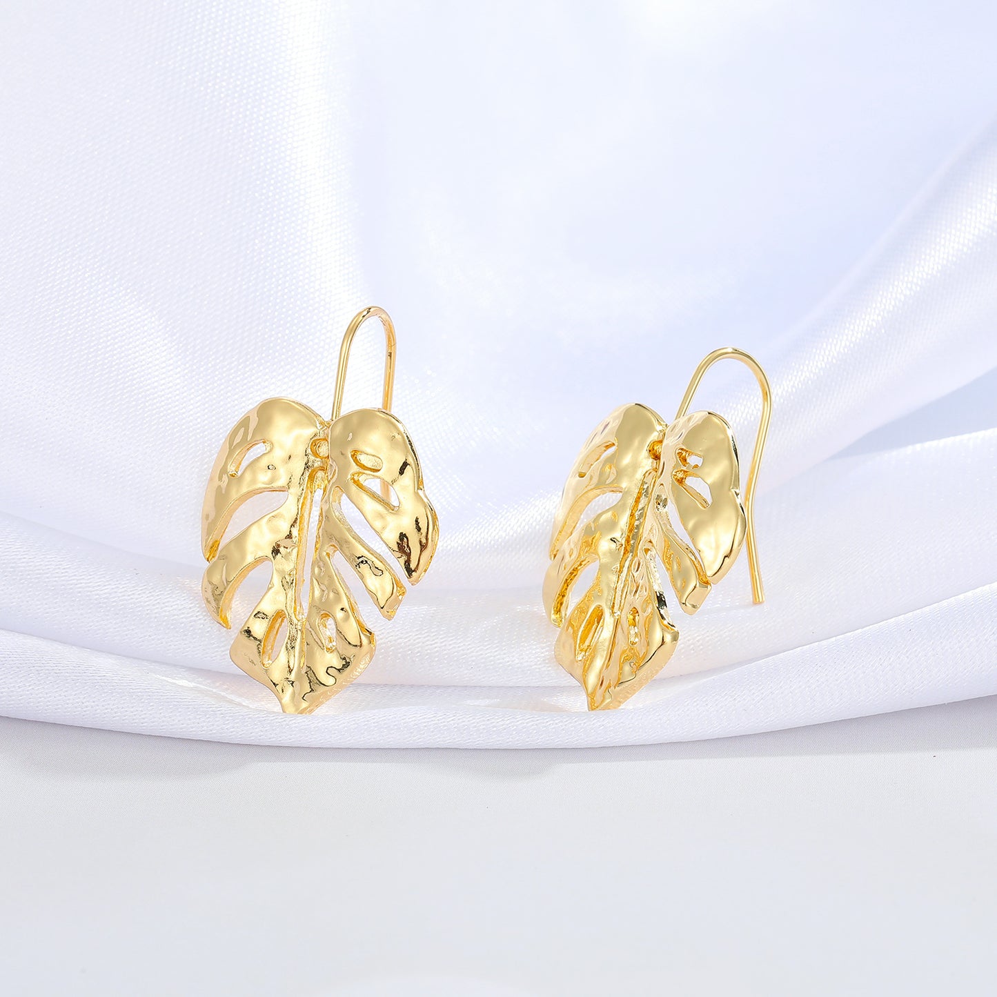 Retro Hollow Leaf Irregular Metal Earrings in Gold Plated Sterling Silver