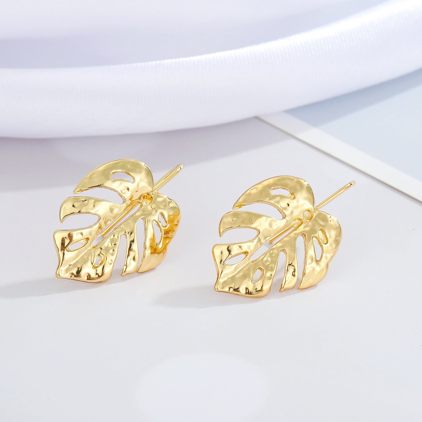 Retro Hollow Leaf Irregular Metal Earrings in Gold Plated Sterling Silver