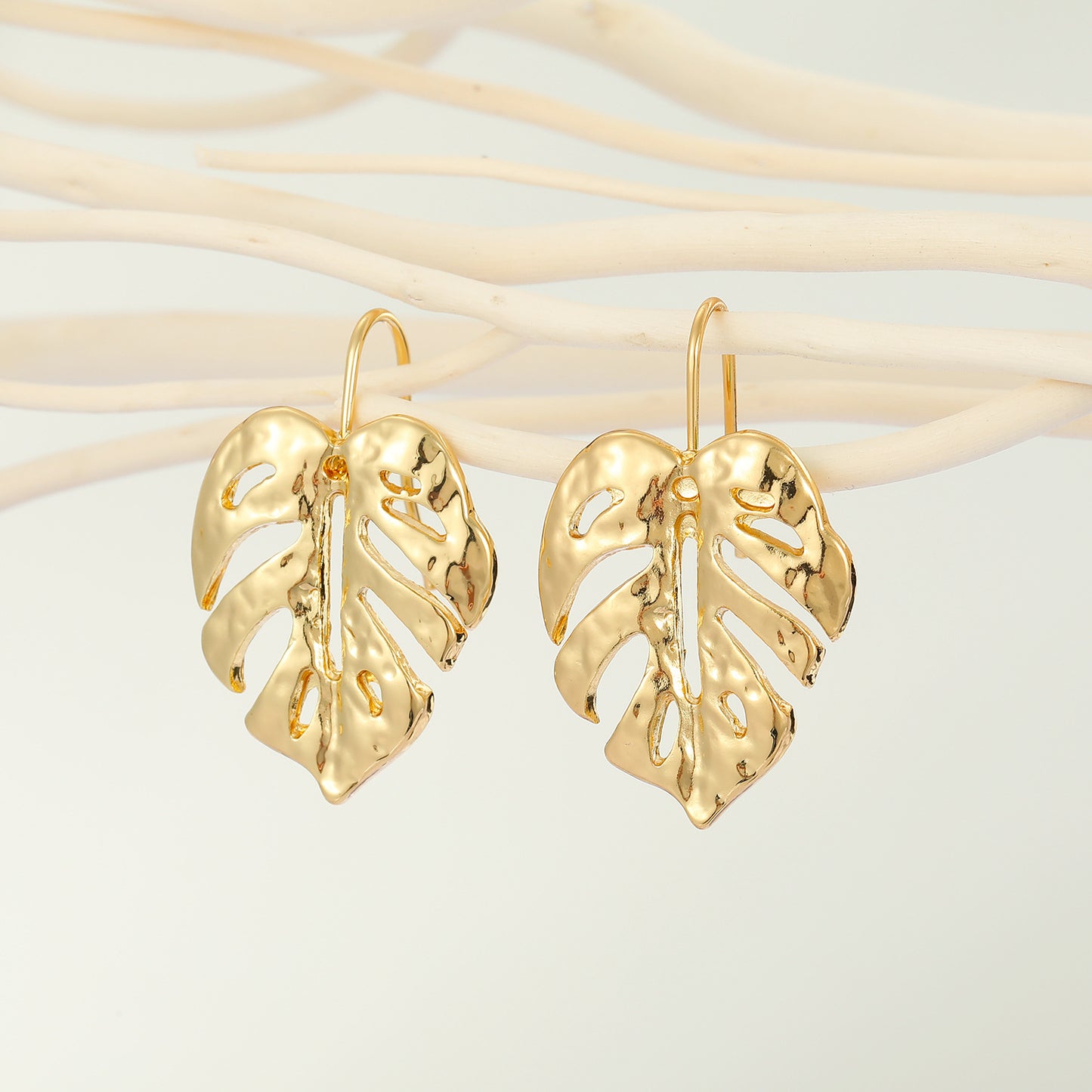 Retro Hollow Leaf Irregular Metal Earrings in Gold Plated Sterling Silver