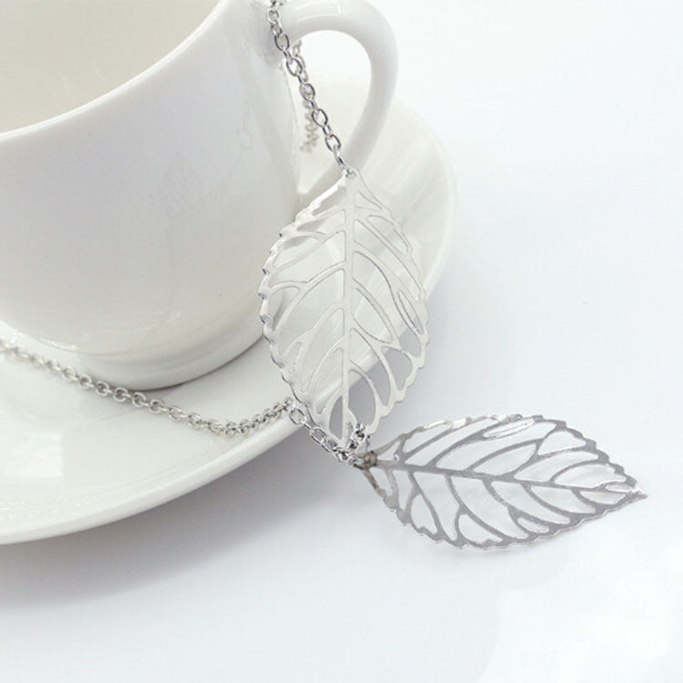 Retro Metal Leaf Pendant Necklace - Vintage Style Hollow Design