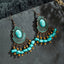 Retro Round Hollow Carved Tassel Alloy Earrings