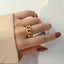 Retro Minimalist Hollow Twist Open Titanium Steel Ring with Chain Design, 18K Gold Plated