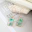 Simple Style Flower Synthetic Resin Alloy Epoxy Transparent Women'S Dangling Earrings 1 Pair
